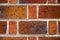 Wall of red brick laid on cement mortar