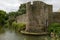 Wall and round tower on moat at Bishop palace ,Wells