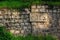 A wall with a ruined Soviet bas-relief at an abandoned Children`s Railway Station in Yerevan. Armenia