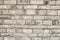 Wall of stone grey bricks, abstract background. Brick wall building