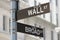 Wall Street and Broad Street corner sign near Stock Exchange in New York