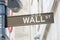 Wall Street sign with street lamp near Stock Exchange, New York