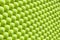 Wall of tennis balls aligned - background