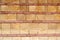 Wall with terracotta bricks and stones