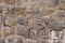 Wall texture background olld stone grunge. Front antique decor house. General layout of stone masonry