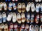 Wall of traditional painted Dutch wooden shoes, clogs, symbol of Netherlands.