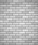 Wall of white brick seamless background