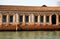 Wall with windows of a former glass factory in Murano sunlit lagoon in Venice in Italy