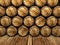 Wall of wooden barrels