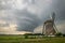 Wallcloud of a supercell thunderstorm near a windmill in The Netherlands