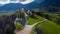 Wallfahrtskirche frauenberg is a beautiful church in the middle of Austria, drone panorama view of a church next to enn river in