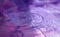 Wallpapers. Frozen movement of water. Drops of water falling and splashing. Violet/pink color.