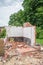 Walls and bricks of demolished house