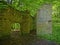 Walls and doorway in the ruins of an old water mill