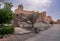 Walls of medieval arabian fortress in Nakhal, Oman. Hot day with haze in the sky. Old arabian castle.