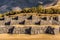 Walls of Sacsayhuaman archeological site at sunset, Cusco, Peru