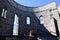 Walls of St Raphael\'s Catholic Church ruins in shadow