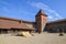 Walls and a tower of an ancient castle in the city of Lida, Belarus