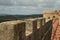 Walls of the town of Magliano in Tuscany. Maremma. .Path on the castle walls. Landscape with countryside