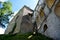 The walls of the Upper Castle of ÄŒeskÃ½ Krumlov against a blue sky, view of the main passage