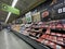 Walmart grocery store interior meat department long view