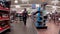 Walmart Supercenter retail store interior workers face mask down around customers