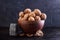 Walnut in a clay bowl, young and broken walnut