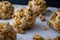 Walnut cookie dough balls with crumbles arount it