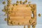 Walnut frame on wooden board