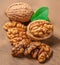 Walnut. Fresh Walnut kernel Nut on wooden background. Organic walnut with green leaves
