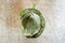 walnut husk on a scratched wood background