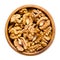 Walnut kernel halves, shelled and dried seeds, in a wooden bowl