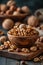 Walnut kernels and walnuts in wooden bowl on dark background