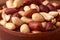walnut peanut in clay bowl. peanuts for food textures. peanut harvest. fried peanuts. texture of the nuts. photo for layout. Close