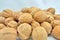 Walnut pile stacked together on white background