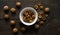 Walnut in a smale plate with scattered shelled nuts and whole nut which standing on a wooden vintage table. Walnuts is a