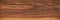 Walnut wood texture.  Natural texture background of North American walnut wood board.  Long wood plank texture.