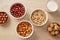 Walnuts, almonds and hazelnuts soaking in water