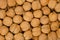 Walnuts background close up, pile of unshelled nuts