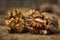 Walnuts cracked open on a wooden table