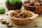 Walnuts green and dry on kitchen table background