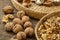 Walnuts on rustic natural burlap, Walnut kernels in wicker basket