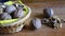 Walnuts whole and cracked in old baskets. Close-up, healthy food with rustic background