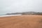 Wandering along the Fisherman Trail in the Algarve region of southwestern Portugal. Human footprints in the sandy surface