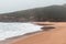 Wandering along the Fisherman Trail in the Algarve region of southwestern Portugal. Human footprints in the sandy surface