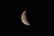 Waning crescent Moon on a dark sky