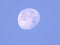 Waning moon in blue color sky in morning