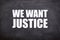 we want justice white text with blackboard background (quotes and justice).