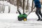 Wantage, NJ, USA - January 13, 2019: Snowblower in action being pushed after snowfall and ice on a cold winter day