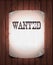 Wanted Sign On Wood Background